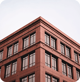 NYC building with compliance certification badge for Local Law 126